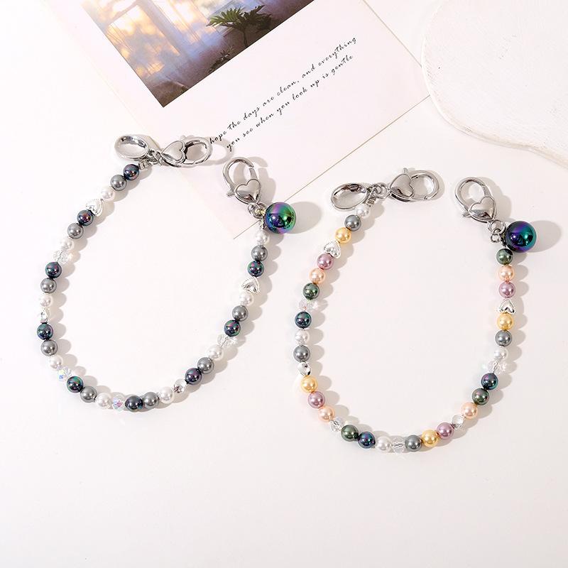 new natural shell pearl hand holding chain bag chain ins mobile phone pendant phone case key chain mobile phone lanyard
