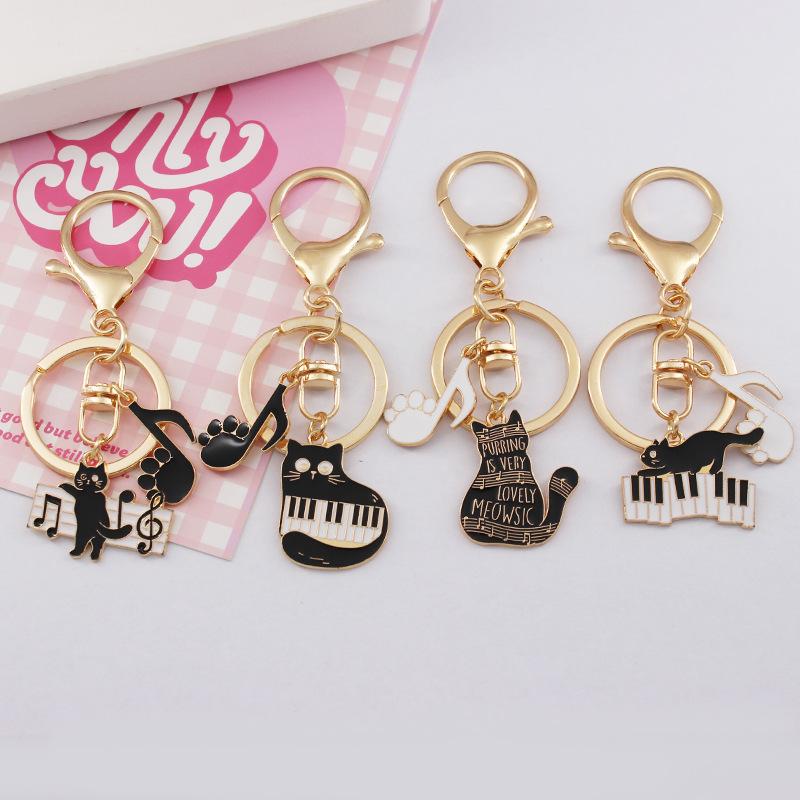 artistic piano notes kitten key buckle  scratch piano music alloy handbag pendant key chain decorative pendant