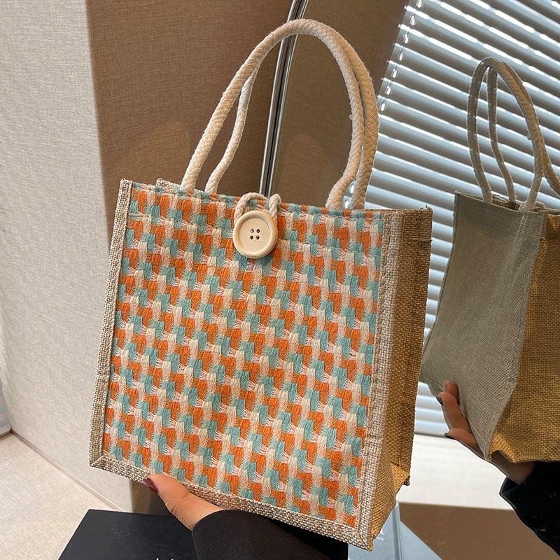 in stock wholesale portable linen bag for women 2023 new linen hand-held gift bag jute woven hand-carrying small shoulder bag