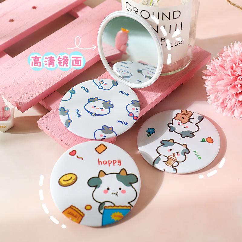 round makeup mirror cute cartoon happy cow mini-portable portable mirror girls makeup small mirror dressing mirror details Picture