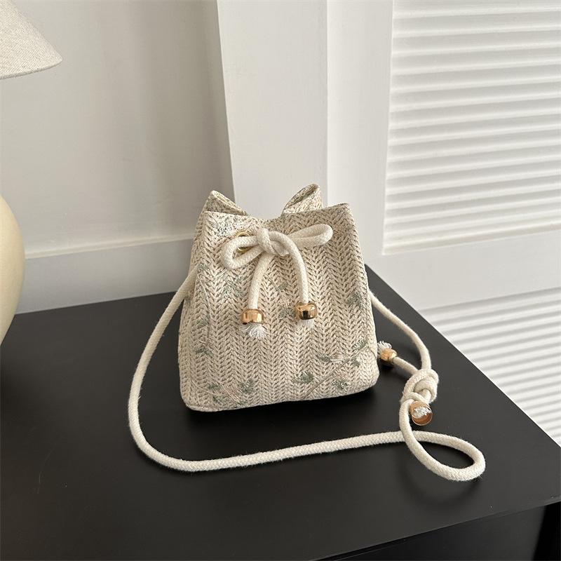 woven bag women's bag new trendy 2023 summer straw woven cute fairy small fresh bucket bag unique one-shoulder messenger bag