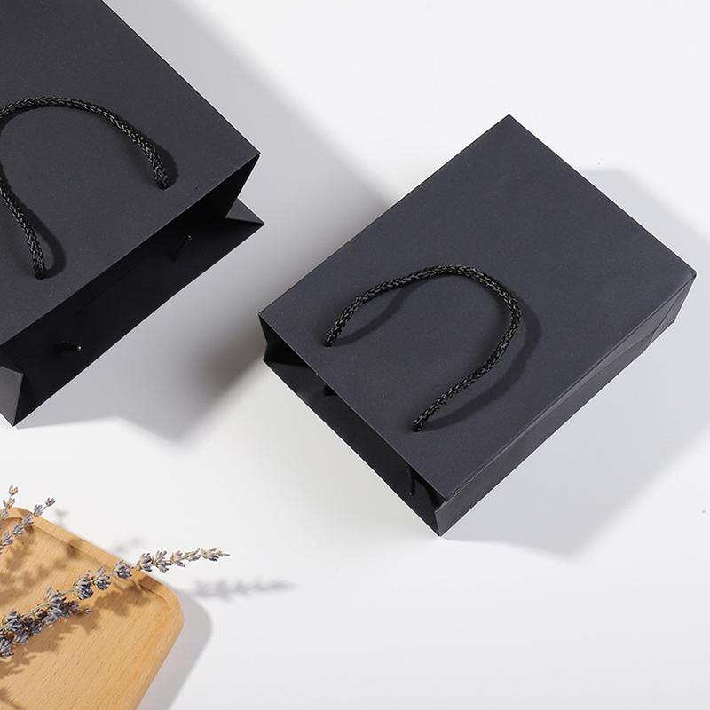 Handbag Kraft Paper Bag Christmas Packaging Gift Bag Gift Clothing Store Women's Clothing Printed Logo Large details Picture