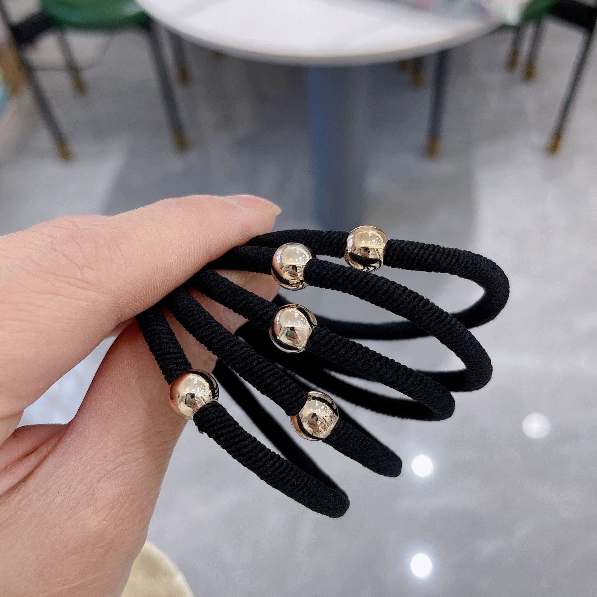The Korean version of the basic metal buckle rubber band hair band for commuting and regular use is mostly suitable for rubber band bracelets details Picture