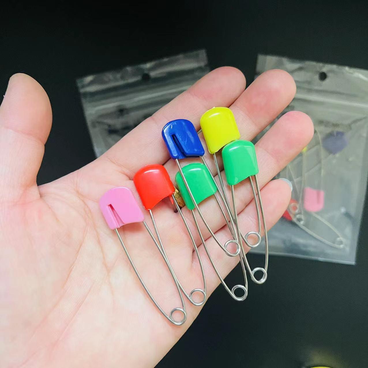 color cartoon child pin multi-purpose baby pin buckle baby's triangular hood saliva towel lock pin details Picture