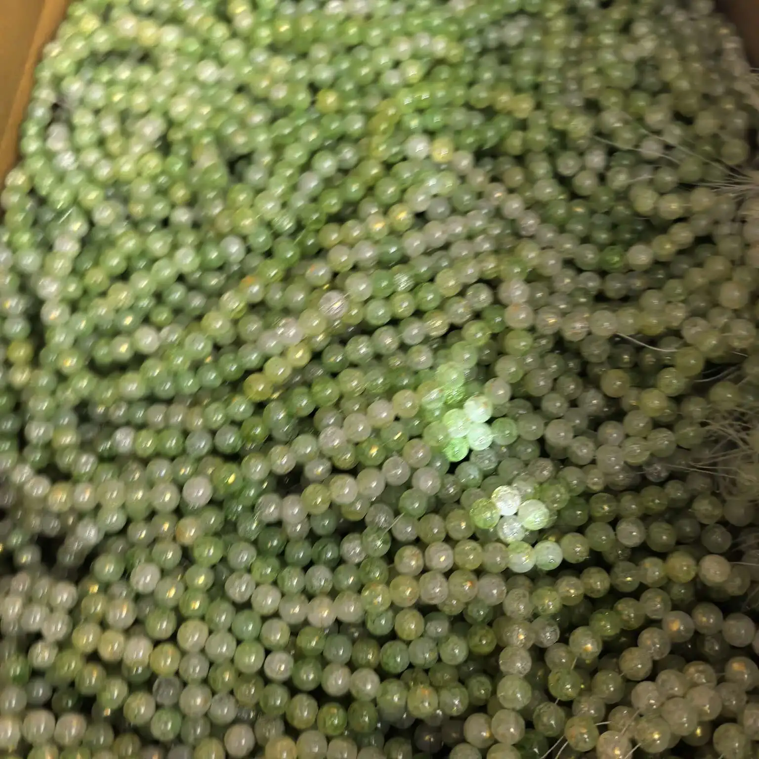 Factory direct supply of 10mm transparent burst beads, glass round beads, tinted glass beads, DIY handcrafted bracelet and necklace materials, traditional Chinese style version detail image 14