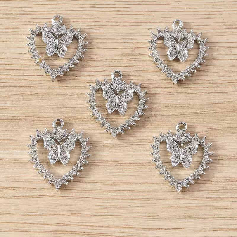 Silver heart-shaped hollowed-out rhinestone butterfly pendant, alloy diamond-encrusted diy jewelry bracelet, earrings, necklace accessories
