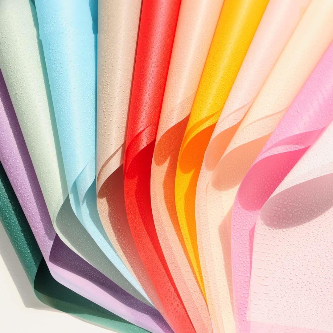 xinqi second generation printed cellophane 19-20 pieces hazy korean plain paper opp translucent bouquet wrapping paper flower packaging