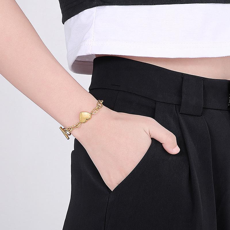 european and american foreign trade ornament fashion love stainless steel jewelry popular heart shaped gold ot titanium steel bracelet details Picture
