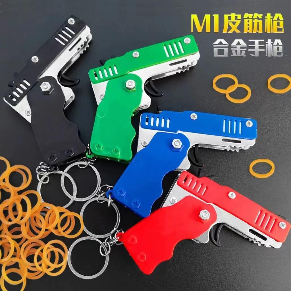 cross-border amazon children's foldable continuous hair rubber gun shooting rubber band pistol metal keychain toy wholesale