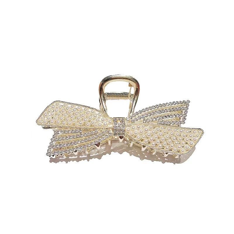 The best-selling pearl bow clip, a large female Internet celebrity clip, exudes a light luxury and high-end look. It's a shark clip for the back of the head detail image 6
