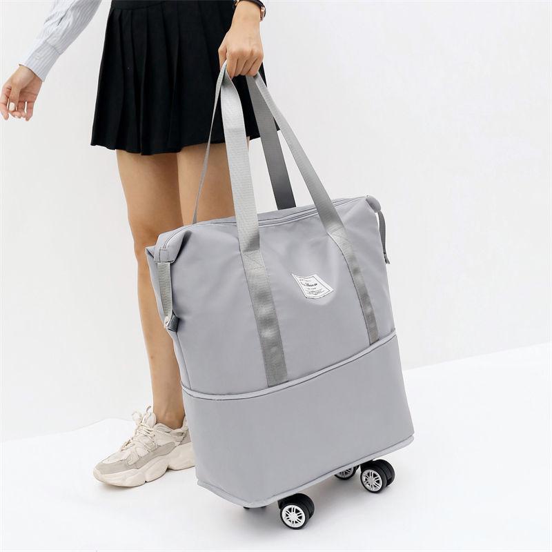 large capacity travel bag scalable shopping bag luggage bag universal wheel travel boarding bag folding student sling bag in a jacket loy