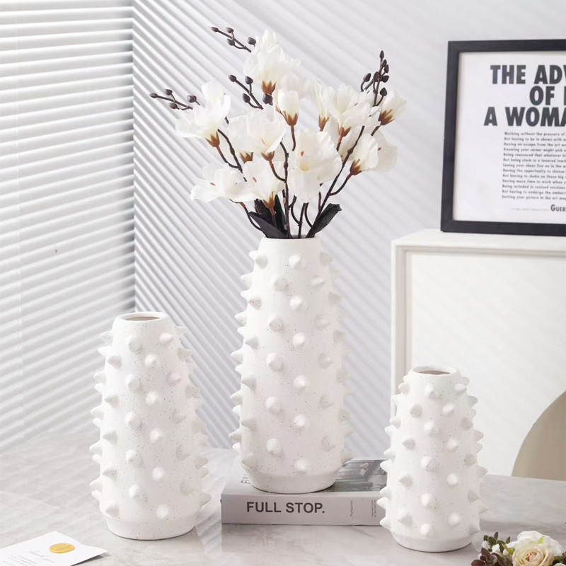 Creative and simple rivet ceramic vases, flower arrangements, flower vases, living room dining tables, wedding model room decorative ornaments details Picture