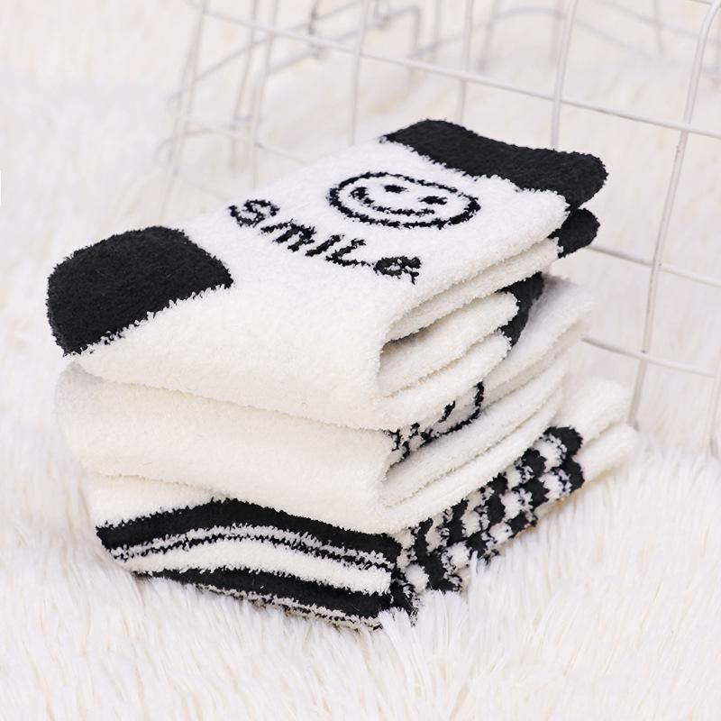 cartoon children's socks wholesale black and white smiley face terry socks towel socks thickened thermal coral fleece baby socks
