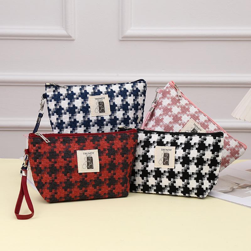 2024新款千鸟格网红手拿化妆包大容量化妆收纳包袋便携旅行洗