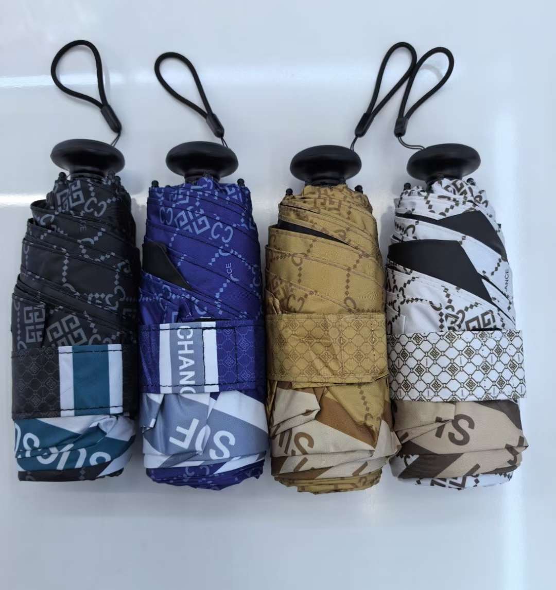 Umbrellas, thumb umbrellas, daily necessities, small household appliances, sunshades, sun umbrellas, rainproof tools, windproof, sunshade and rainproof three-fold umbrellas, stalls, annual inspection, practical and portable detail image 11