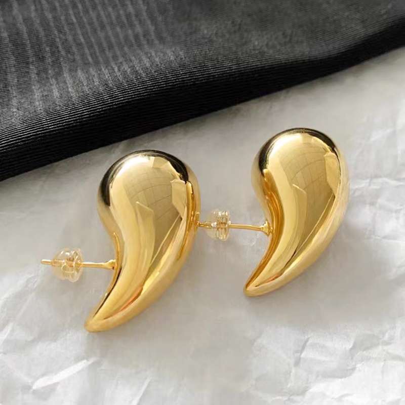 Gold and silver needle, exaggerated European and American teardrop ear studs, women's light luxury, niche and high-end earrings and accessories, best-selling creative accessories from online merchants