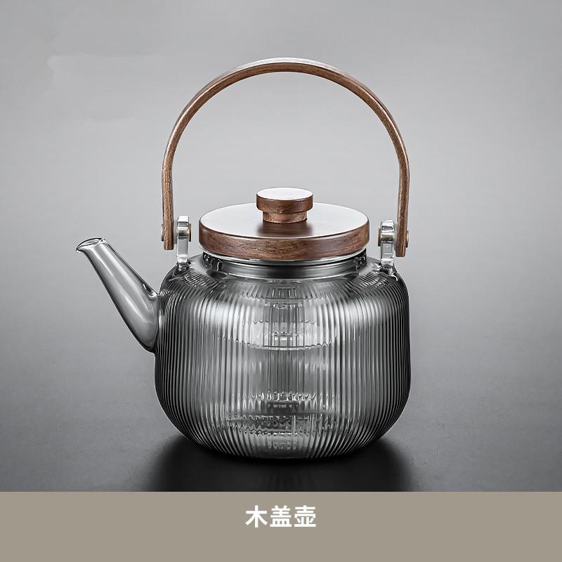 wholesale steaming and boiling dual-purpose loop-handled teapot borosilicate glass teapot steam teapot wooden lid steaming and boiling dual-purpose loop-handled teapot
