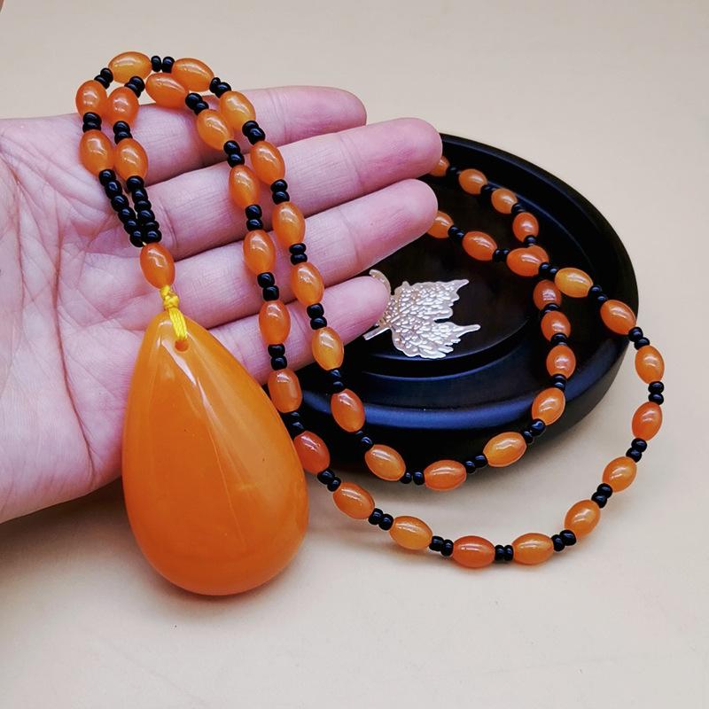 second generation orange beeswax necklace water drop pendant sweater chain live broadcast gift artistic retro yellow chicken grease amber pendant full figure
