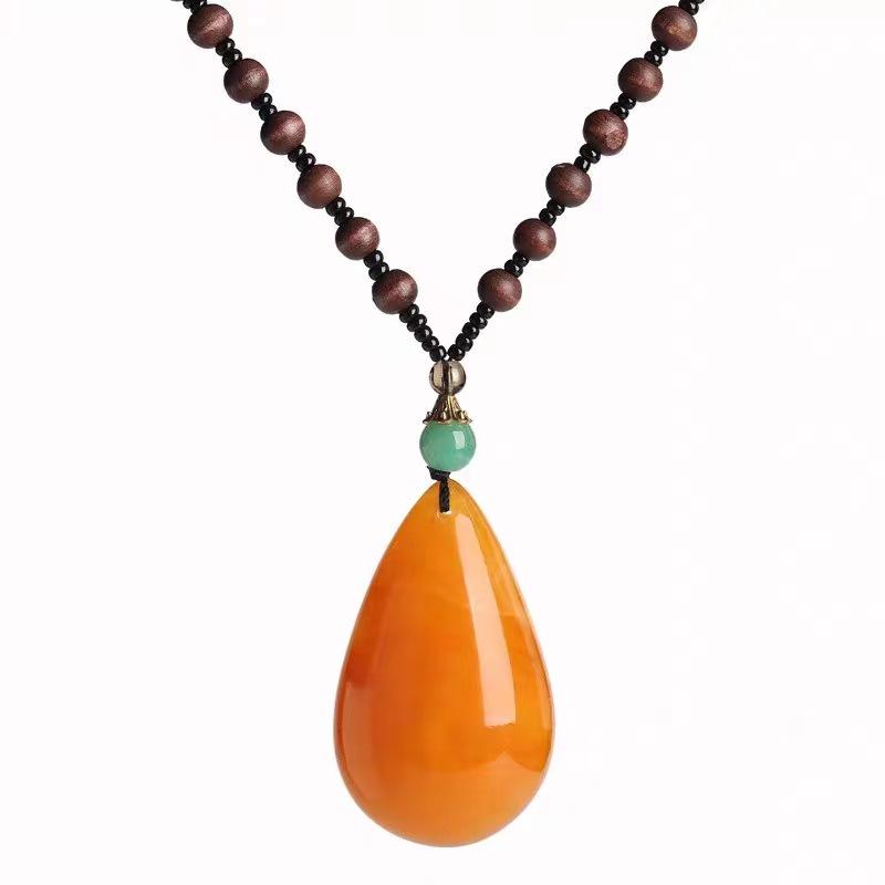 second generation orange beeswax necklace water drop pendant sweater chain live broadcast gift artistic retro yellow chicken grease amber pendant Item Picture
