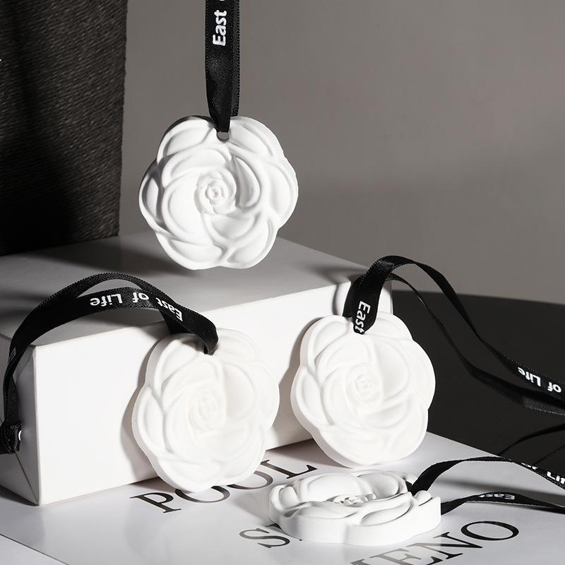 Wholesale camellia Car Aromatherapy Hanging Piece Home Wardrobe Wardrobe Aromatherapy Wax Piece Gypsum Incense Piece Air Freshener details Picture