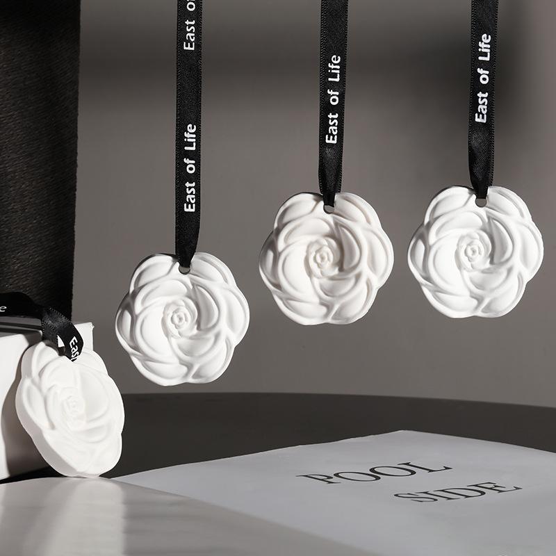 Wholesale camellia Car Aromatherapy Hanging Piece Home Wardrobe Wardrobe Aromatherapy Wax Piece Gypsum Incense Piece Air Freshener full figure