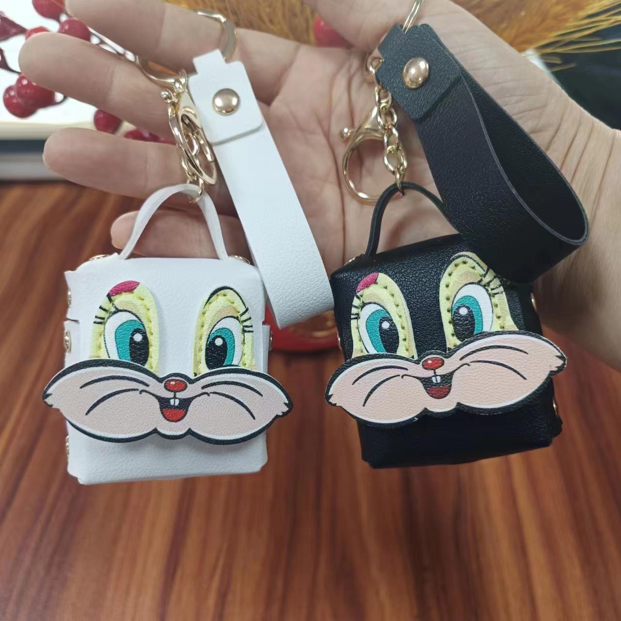 cross-border decompression happy rabbit mini keychain bag pack bluetooth headset protective cover leather keychain bag hanging