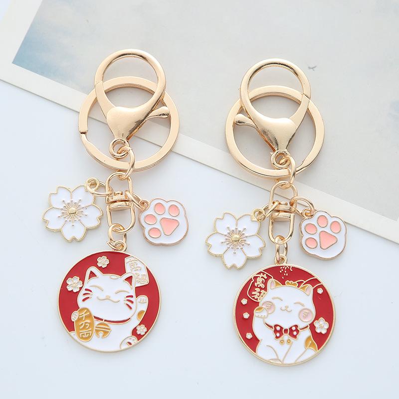 creative cartoon waving couple keychain cute flower cat's paw girl heart couple bags pendant small gift