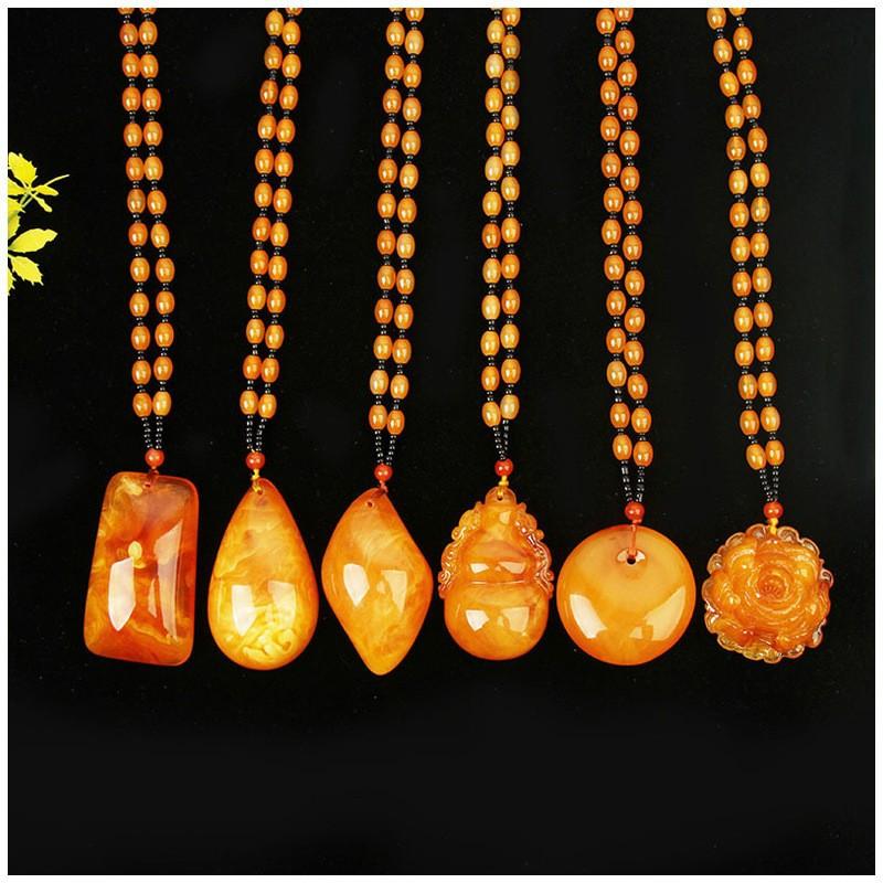 old beeswax pendant sweater chain mother's day gift second generation yellow chicken grease amber long pendant imitation beeswax necklace details Picture