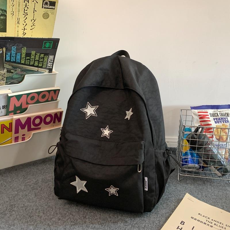可爱星星双肩包2024夏季新款中学生女孩韩版书包高中生小清新书包