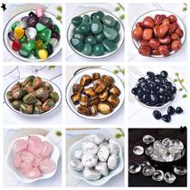 polished rolling stone grinding stone white crystal pink crystal obsidian green dongling green gold tigereye amazonite amethyst blue pattern