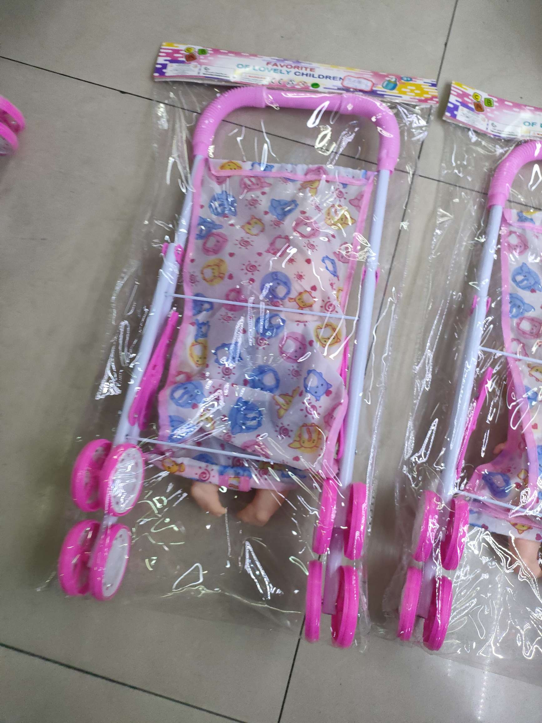 新款娃娃推车套装，男孩女孩两款混装，卡头袋包装。26元/套，36套/箱。娃娃推车新款热销详情图13