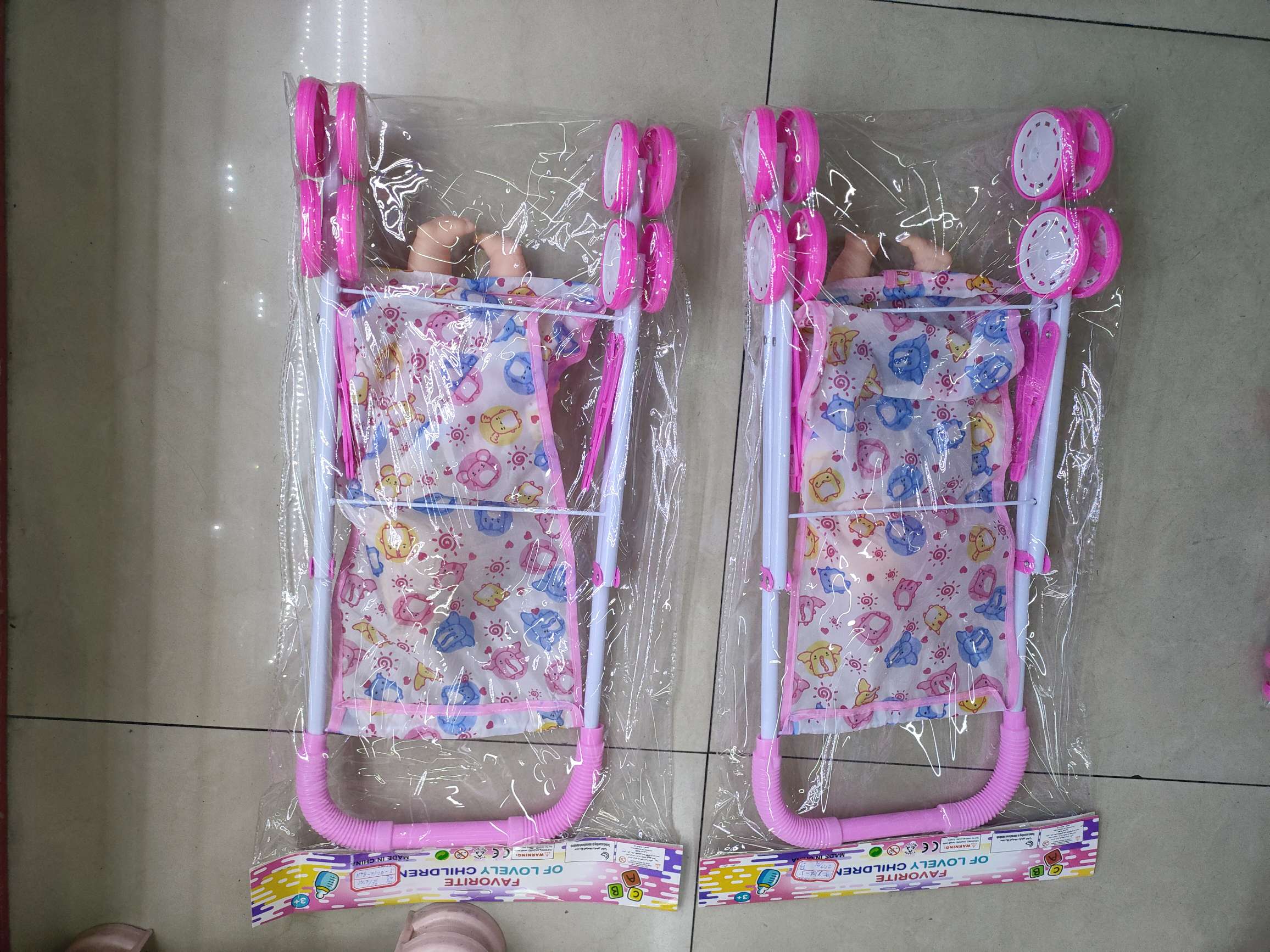 新款娃娃推车套装，男孩女孩两款混装，卡头袋包装。26元/套，36套/箱。娃娃推车新款热销详情图15