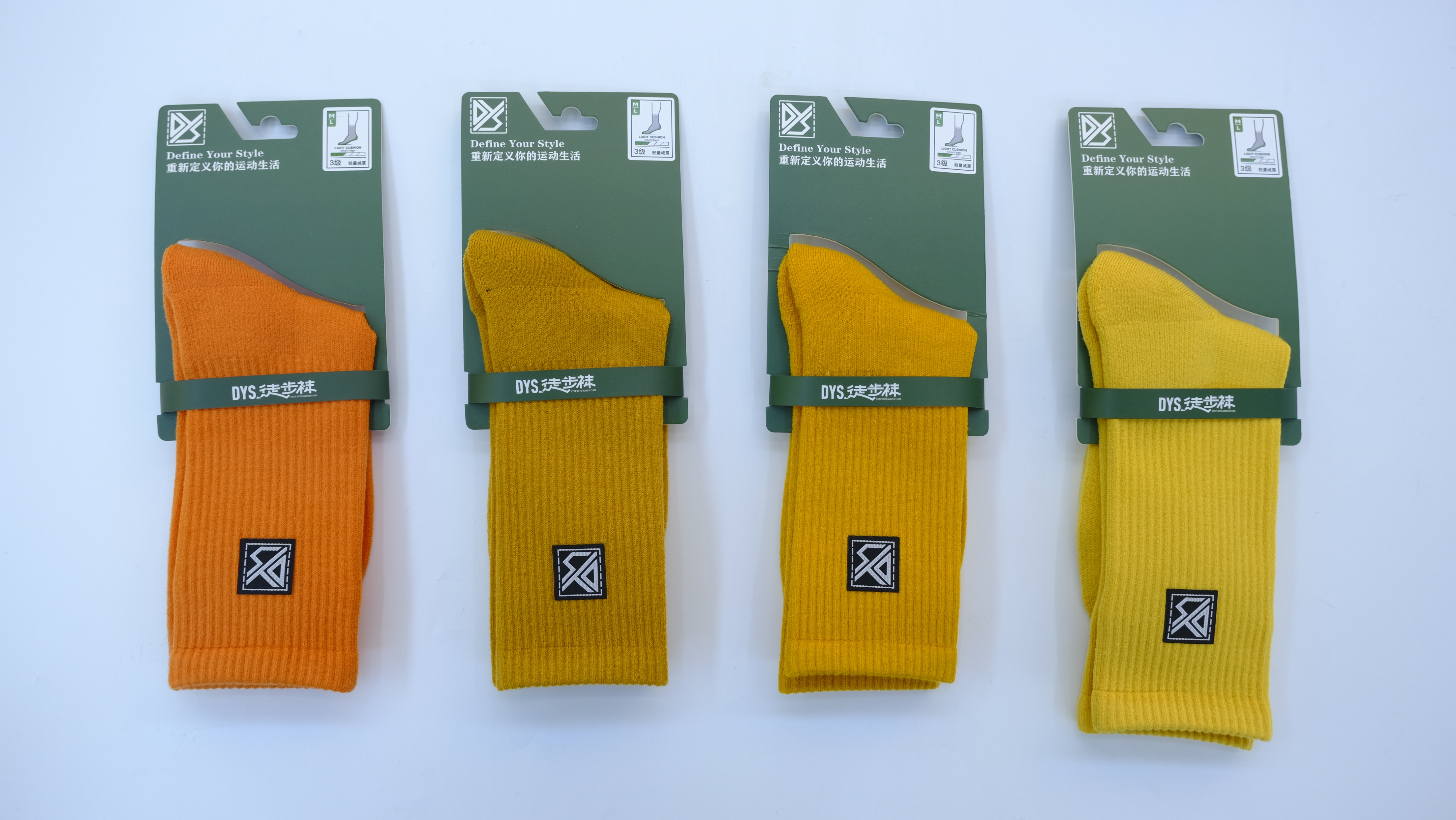 Flat lay of multiple colored wool hiking socks arranged in a sunburst pattern