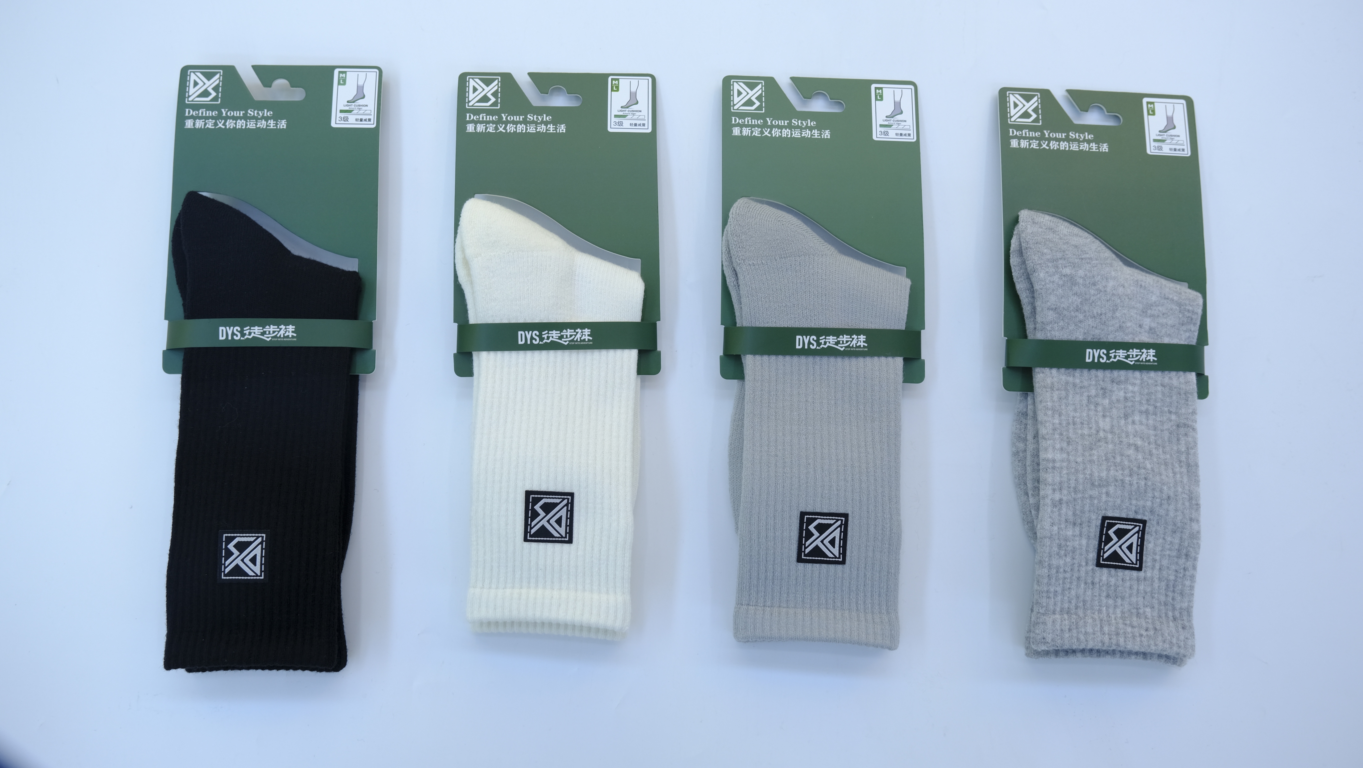 Pair of hiking socks laid flat showing ergonomic contour and heel support zone