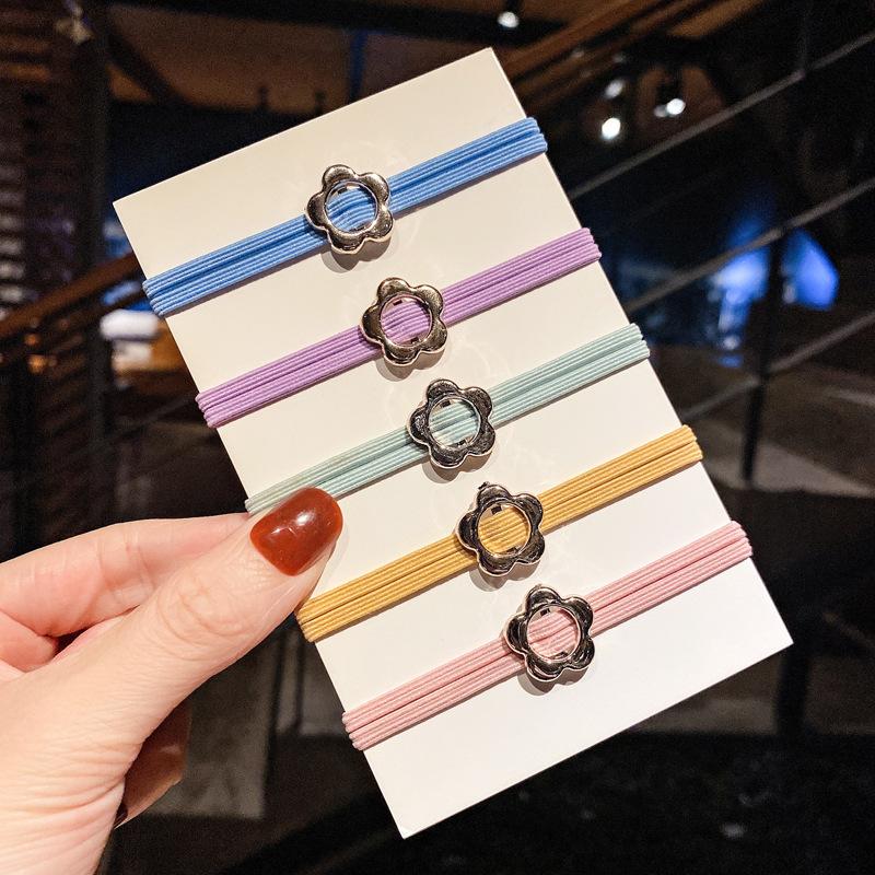 japanese-style simple hollow-out golden balls hair band girl tie hair small rubber band hair rope partysu hair accessories hair rope female wholesale Application Scenario