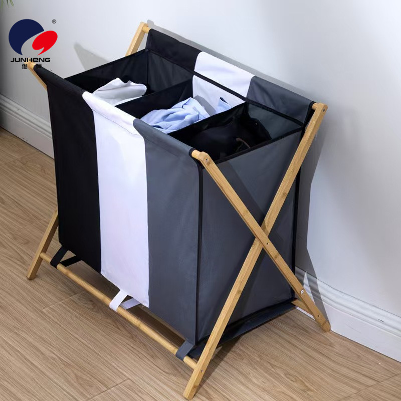 Folding dirty clothes basket, household dirty clothes storage basket, bamboo fabric clothes compartments storage, classification laundry basket details Picture