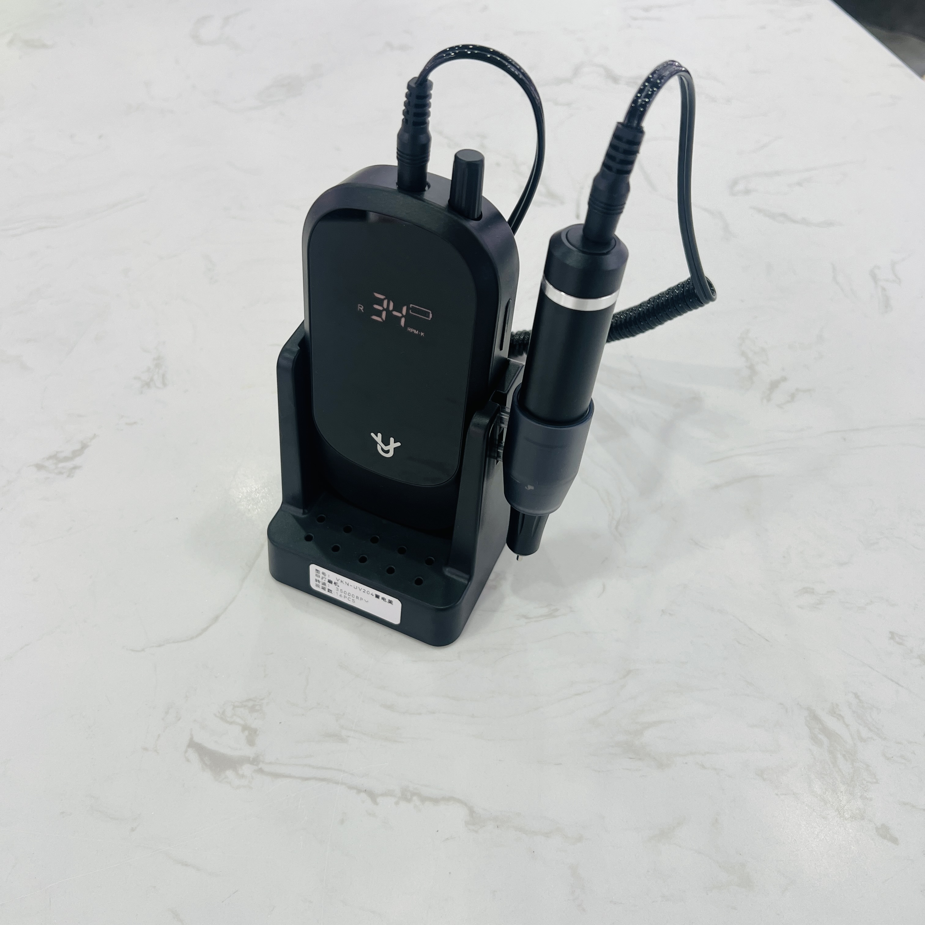 The new UV204 nail polish grinder features a 35000 RPM nail polish and polishing battery with a liquid crystal display details Picture