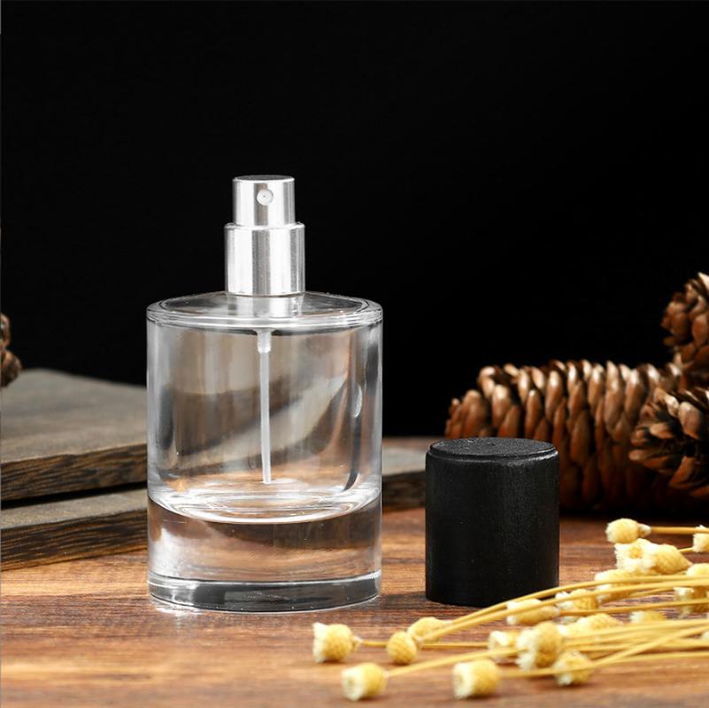 in stock supply perfume sub-bottles transparent spray portable glass perfume bottle 50ml round empty pump