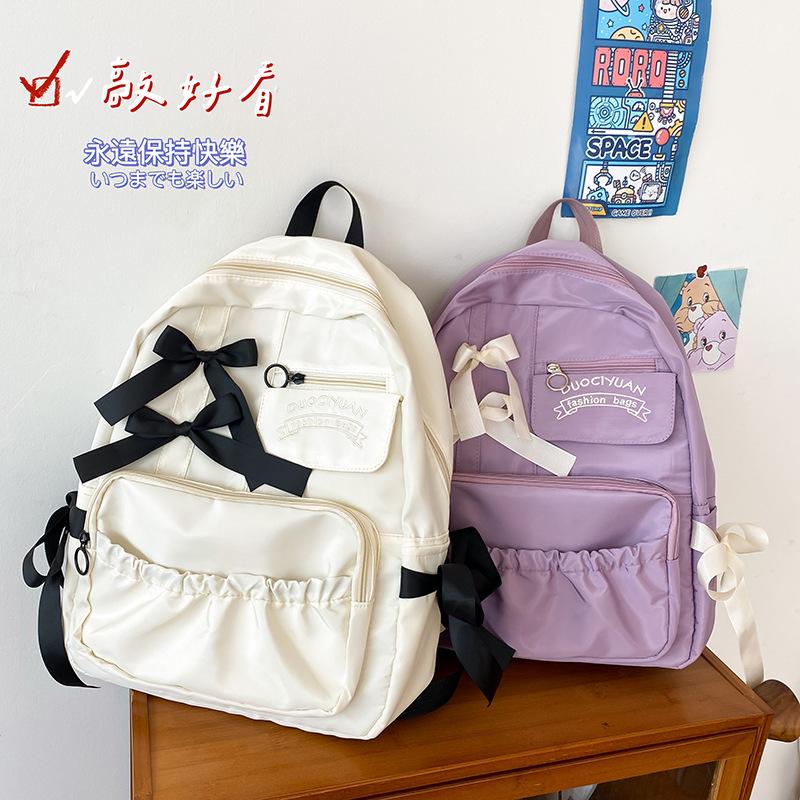 japanese anime peripheral college style cute contrast color bow pleated personality soft girl student schoolbag backpack female full figure
