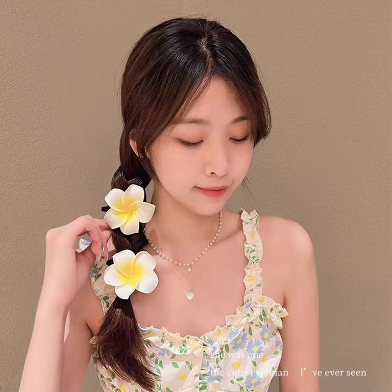 Korean version sweet pearl frellia hair clip, Dai festival hair accessory, beach vacation flower side hair clip headwear Item Picture