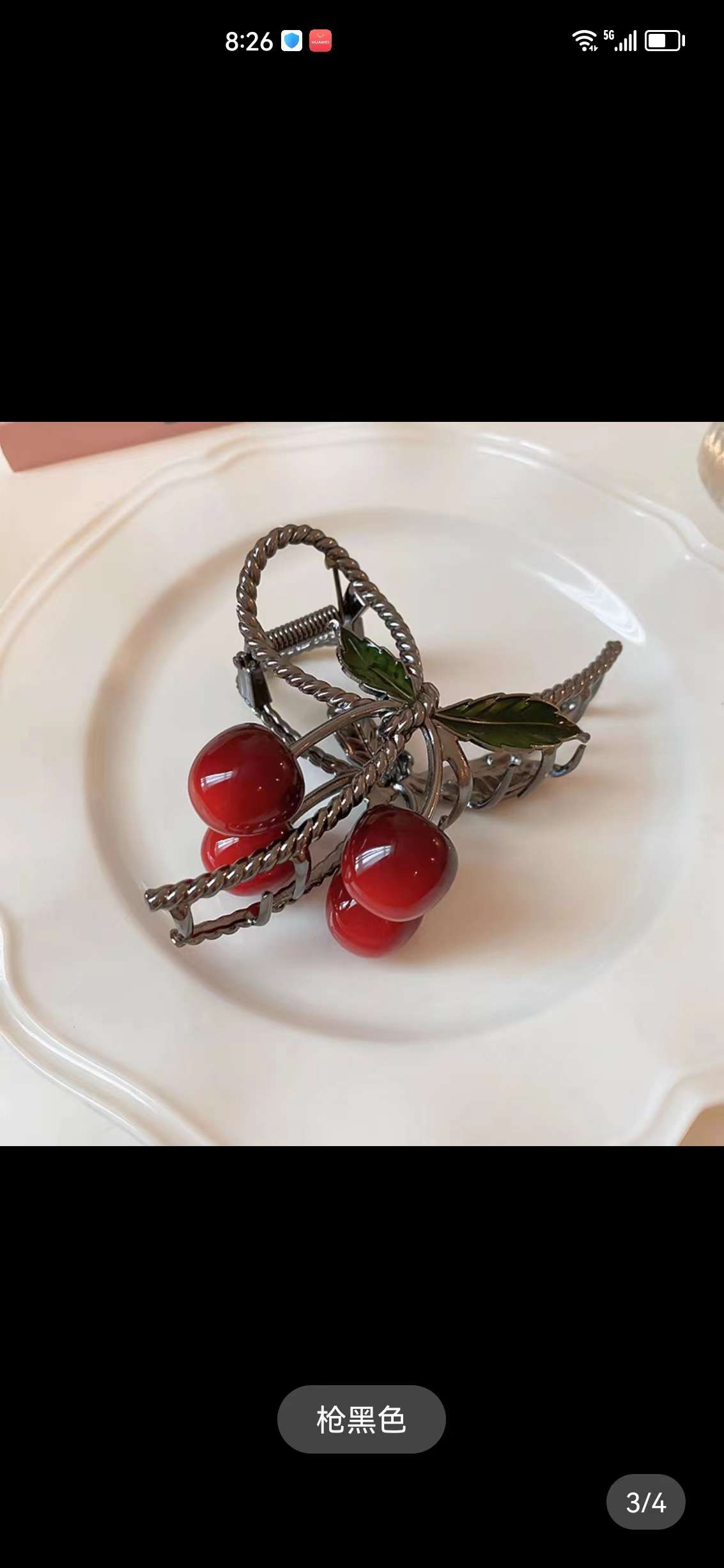 大号樱桃大抓夹。网红爆款樱桃大抓夹。金色，枪黑色。产品图