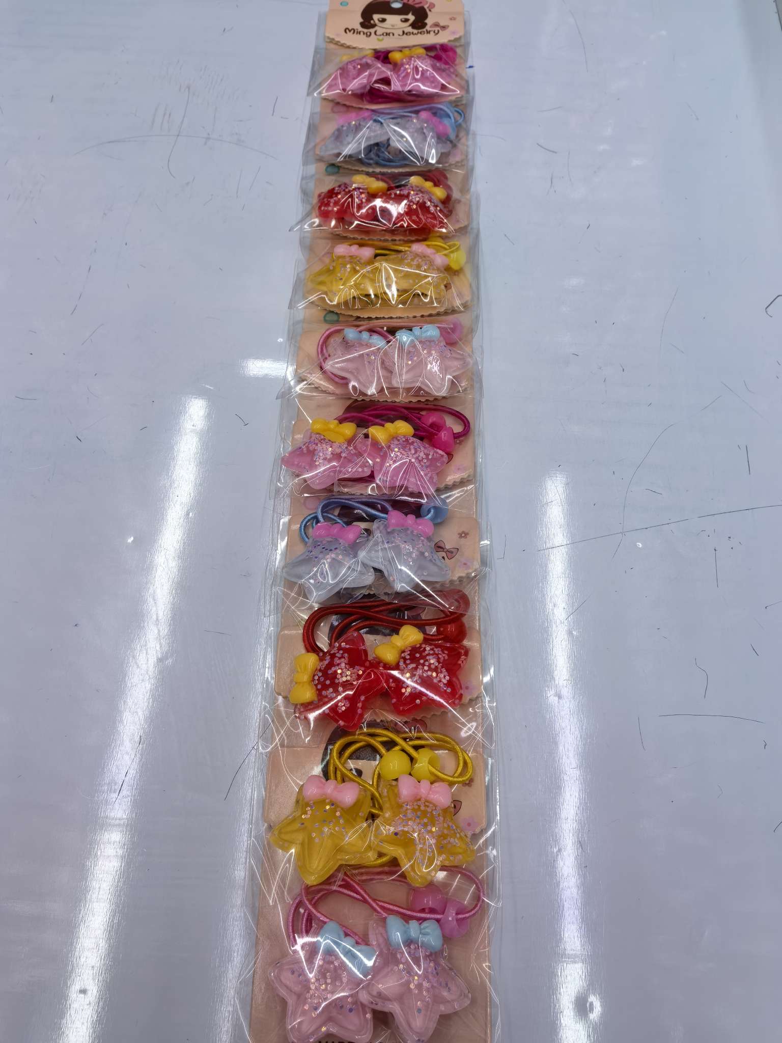 最近流行款星星带着领结金粉树脂茗兰饰品3007B