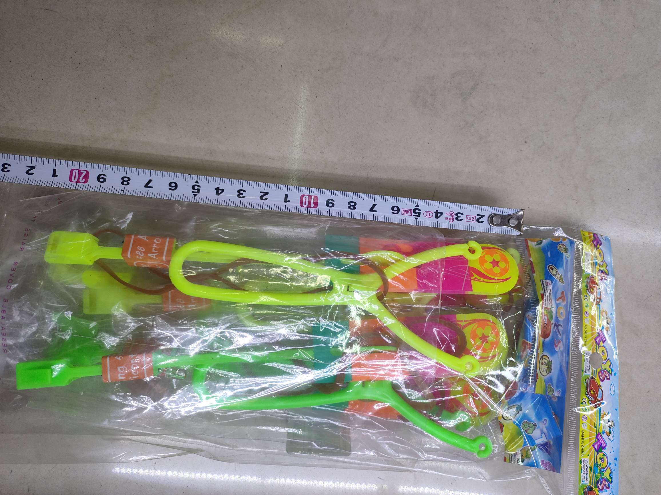 带灯弹弓飞灯玩具，opp袋装，混色。0.52元/个，2000个/箱。热门地摊摆摊批发产品图