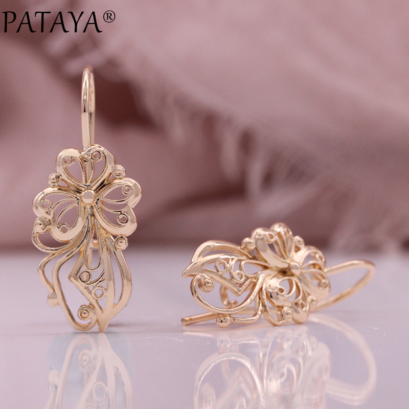 Factory direct supply of cross-border European and American women's ear hooks, fashionable and creative exaggerated accessories, rose golden surface spherical hollowed-out earrings. Factory direct supply wholesale details Picture