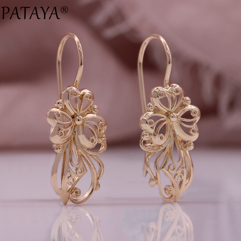 Factory direct supply of cross-border European and American women's ear hooks, fashionable and creative exaggerated accessories, rose golden surface spherical hollowed-out earrings. Factory direct supply wholesale