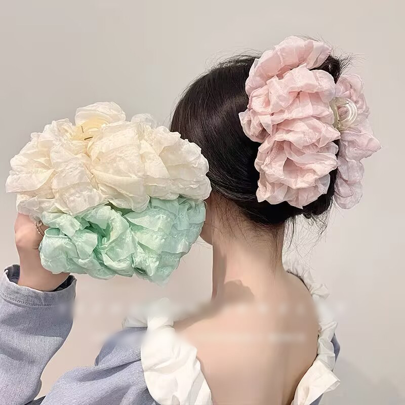 新款泡泡云朵抓夹！蝴蝶结发饰头饰饰品 精致发夹抓夹 女士优雅气质必备款式 造型百搭时尚新款产品图