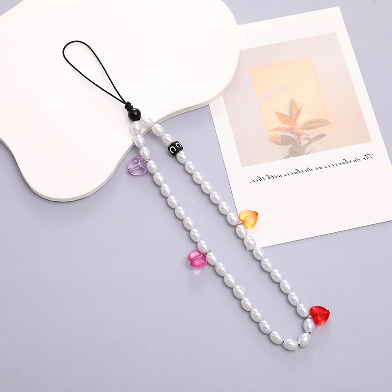 Hot-selling internet-famous beaded heart-shaped mobile phone chain, anti-loss and anti-drop phone case diy pearl pendant, short mobile phone detail image 4