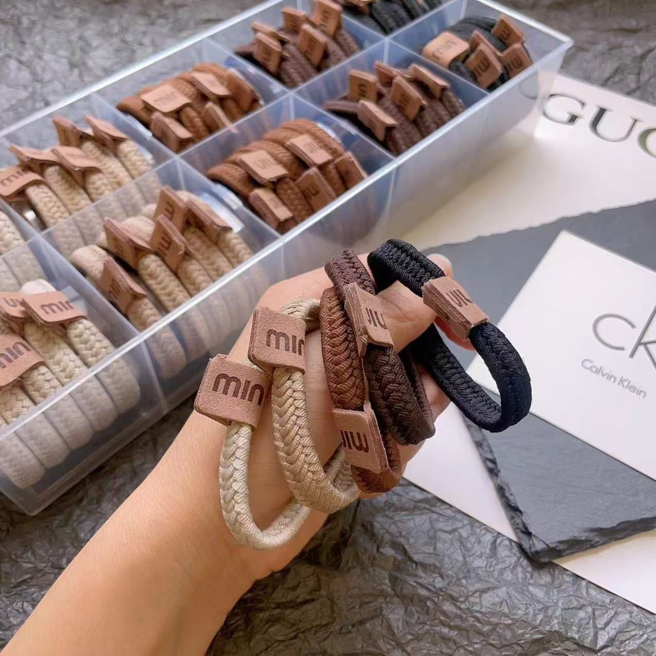 Korean-style wide rubber band commuting multi-purpose bracelet, simple style, strong pull, no age limit, style with a rubber band tied at the head