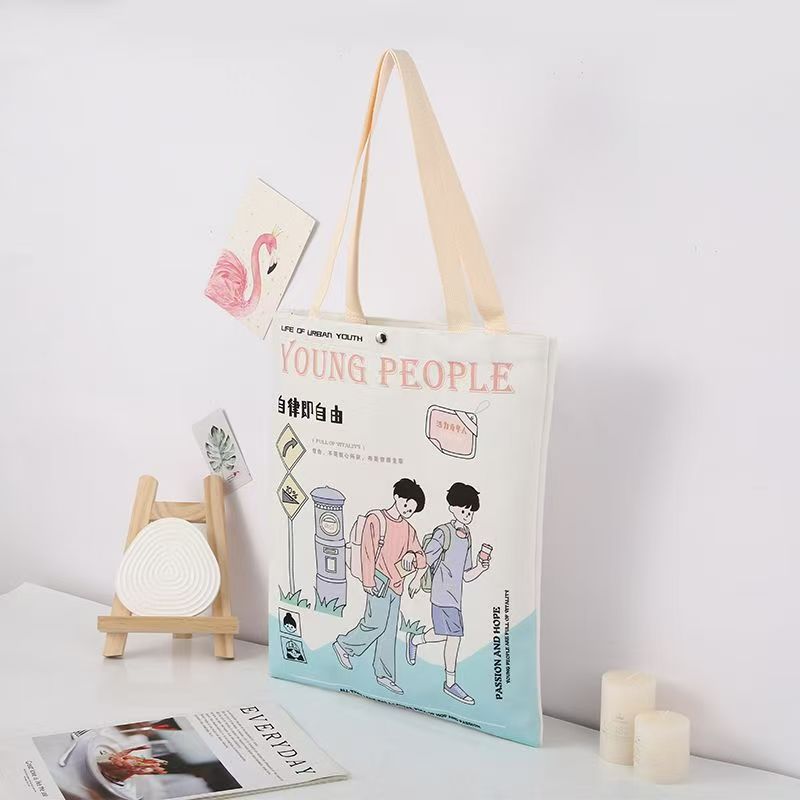 柔软绒布单肩背包 印花按扣手提袋白底实物图