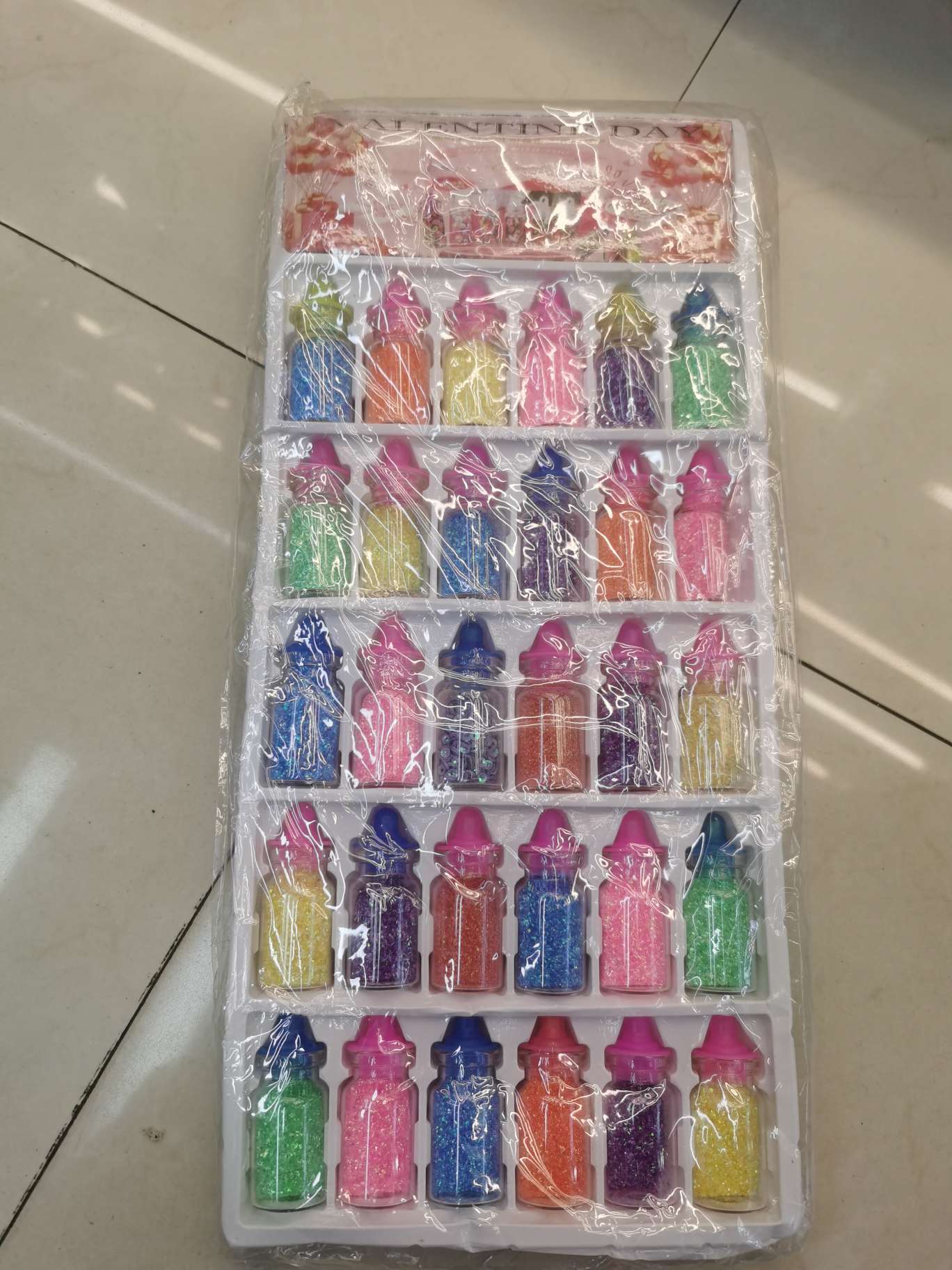 Premium gold powder bottle, brand-new packaging. Premium gold powder bottle, brand-new packaging. Premium gold powder bottle, brand-new packaging